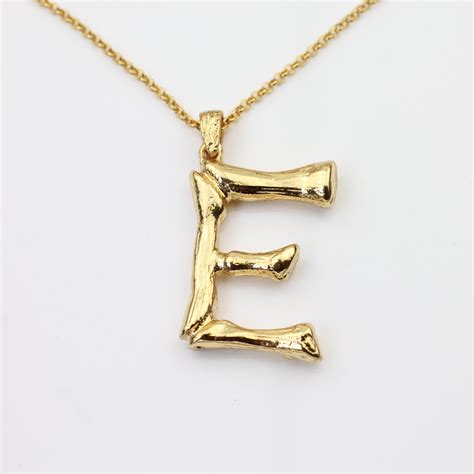 where to buy celine letter necklace|celine initial necklace.